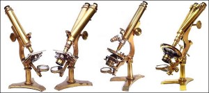 Four brass antique microscopes Reports